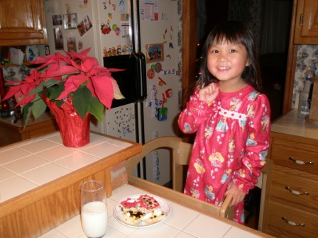 Kasen leaving cookies and milk for Santa